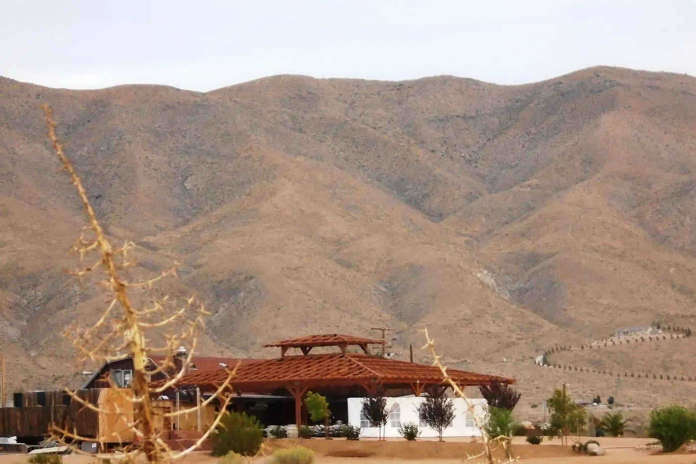 The historic Apple Valley Inn with the San Bernardino Mountains behind