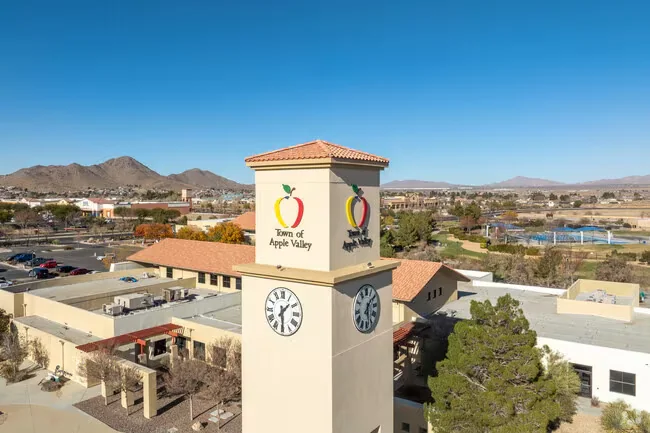 The Town of Apple Valley clock tower at Town Hall, with the desert hills behind